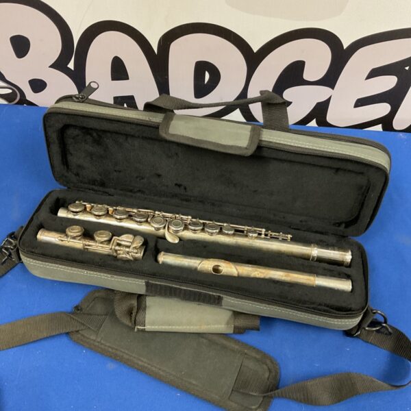 Yamaha 211s concert flute in open grey carry case with shoulder strap