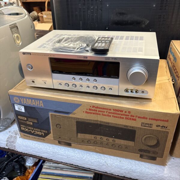 Boxed Yamaha RX-3361 AV receiver with remote control for home audio.