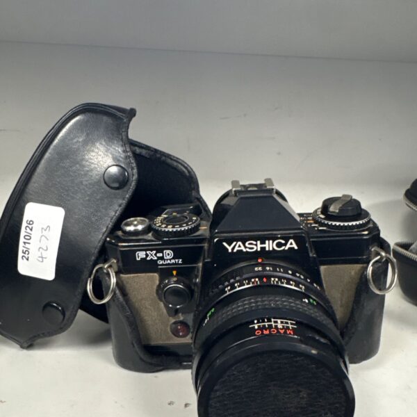 Yashica FX-D Quartz SLR camera with black leather case