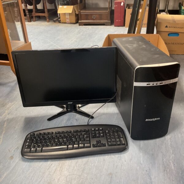 Zoostrom desktop PC with Acer monitor, keyboard and mouse.